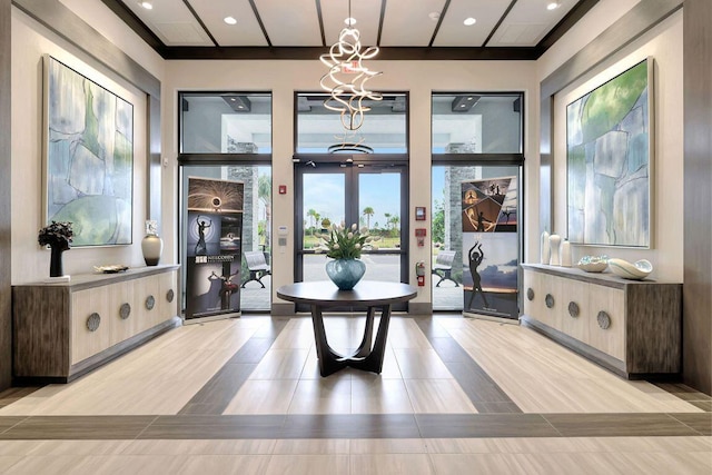 interior space featuring recessed lighting and a notable chandelier