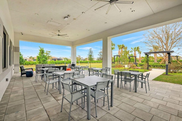 view of patio featuring ceiling fan