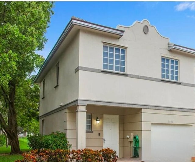 view of front of property with a garage