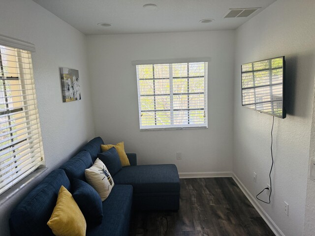 hall featuring ornamental molding and light tile patterned flooring