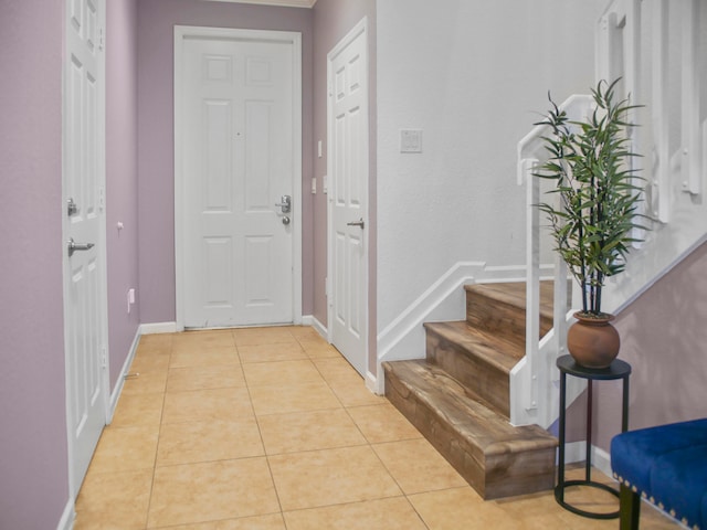 view of tiled foyer entrance