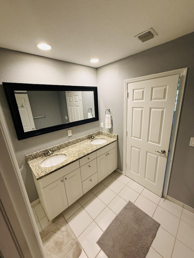 bathroom featuring vanity and tile patterned floors