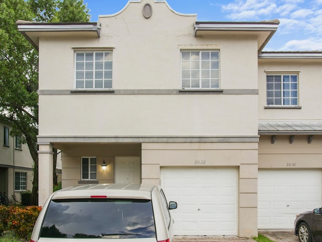 view of front of home with a garage