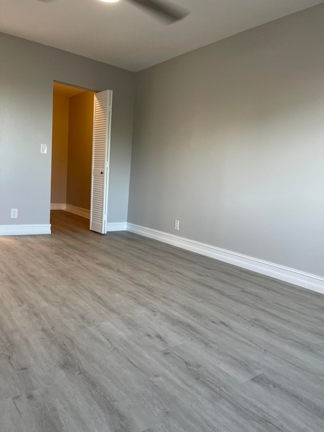 unfurnished room featuring light hardwood / wood-style floors