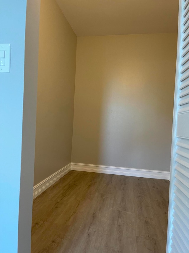 spare room with light hardwood / wood-style flooring