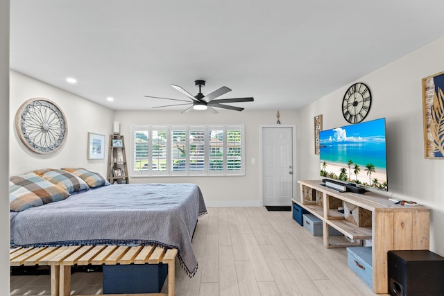 bedroom featuring ceiling fan and light wood-type flooring