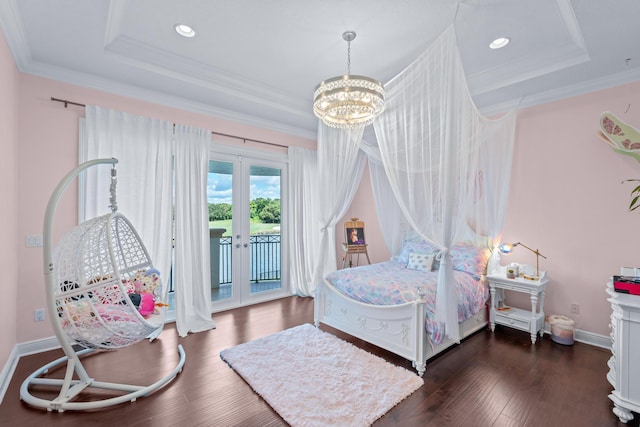 bedroom with access to outside, dark hardwood / wood-style flooring, a chandelier, and french doors