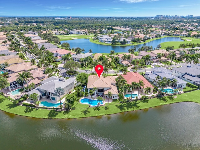 drone / aerial view with a water view