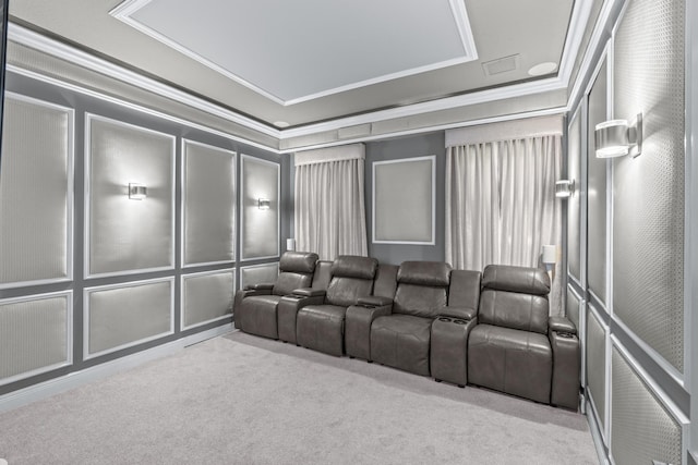 cinema featuring light colored carpet and ornamental molding