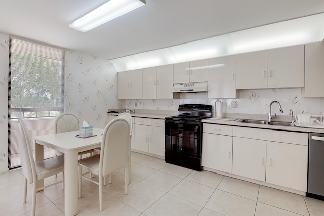 kitchen with white cabinetry, sink, black electric range oven, and stainless steel dishwasher