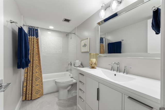 full bathroom with shower / tub combo, vanity, and toilet