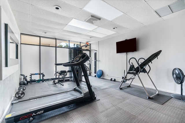 exercise area with a drop ceiling