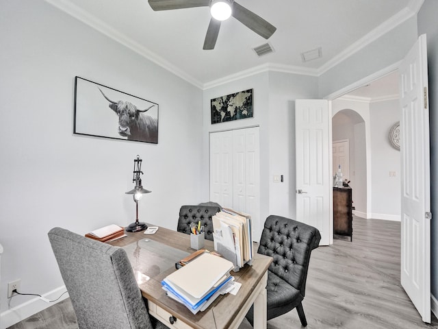 office with ceiling fan, light hardwood / wood-style flooring, and crown molding