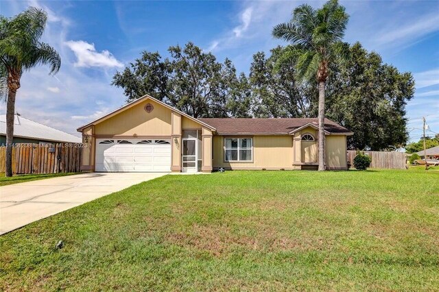 ranch-style house with a front lawn and a garage