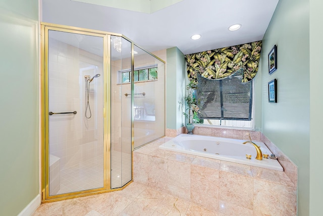 bathroom with shower with separate bathtub