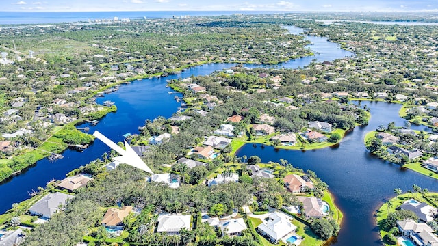 drone / aerial view with a water view