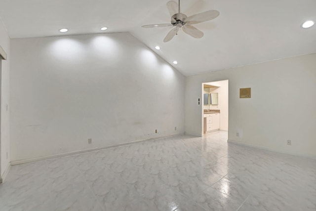 spare room with lofted ceiling and ceiling fan