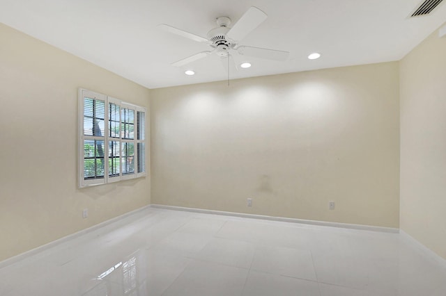 spare room featuring ceiling fan