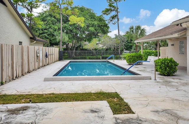 view of pool featuring a patio