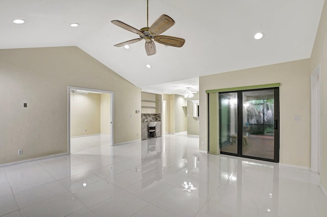 tiled spare room with ceiling fan and lofted ceiling