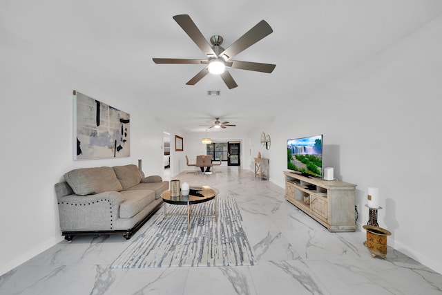 living room featuring ceiling fan