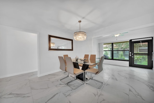 dining area featuring a chandelier