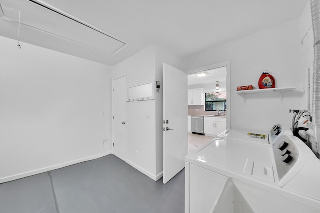 laundry room with washer and dryer