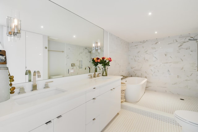 full bathroom featuring toilet, vanity, tile walls, and separate shower and tub