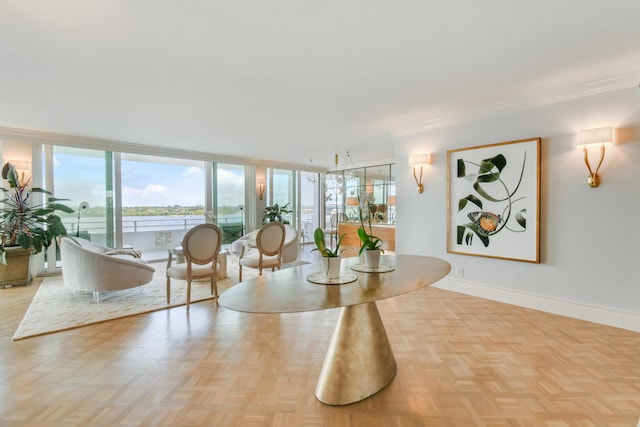 interior space with ornamental molding and light parquet floors