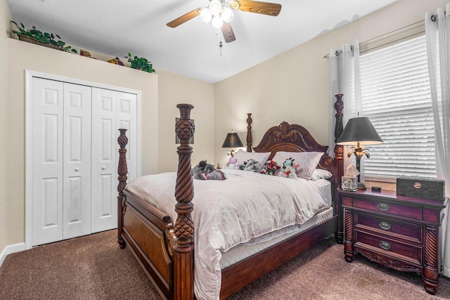 bedroom with carpet flooring, ceiling fan, and a closet