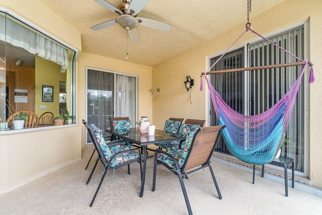 view of patio / terrace featuring ceiling fan