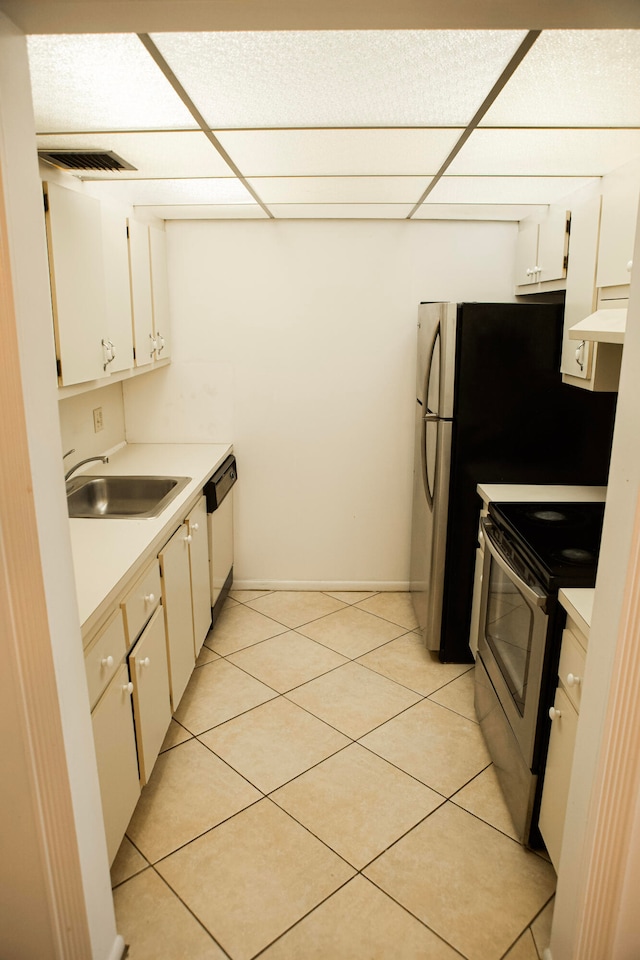 kitchen featuring dishwasher, sink, stainless steel electric stove, white cabinets, and ventilation hood