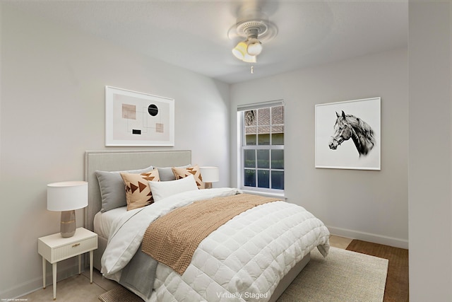 carpeted bedroom featuring ceiling fan