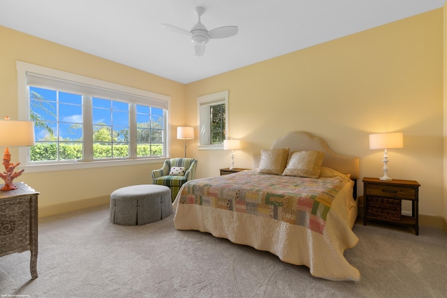 bedroom featuring ceiling fan and carpet floors