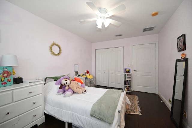 bedroom with dark wood-type flooring and ceiling fan