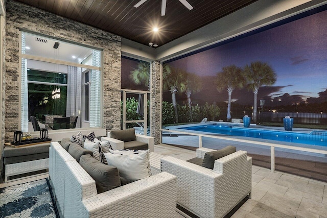 view of patio / terrace with outdoor lounge area, ceiling fan, and a fenced in pool