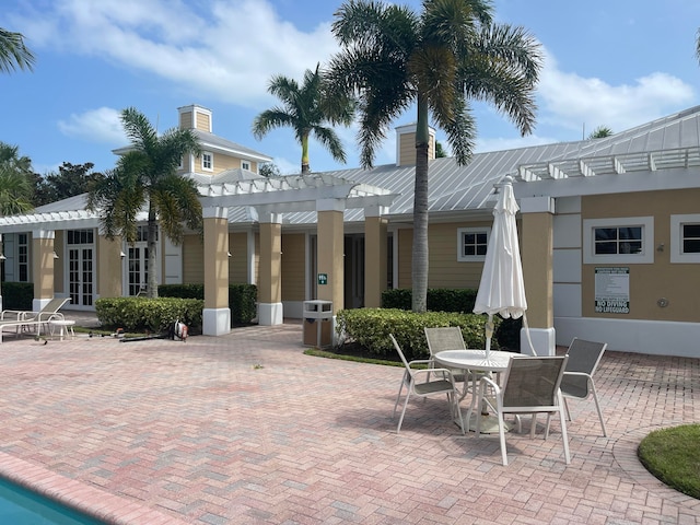 view of patio / terrace featuring a pergola