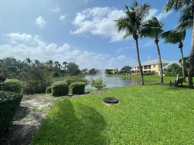 view of yard with a water view