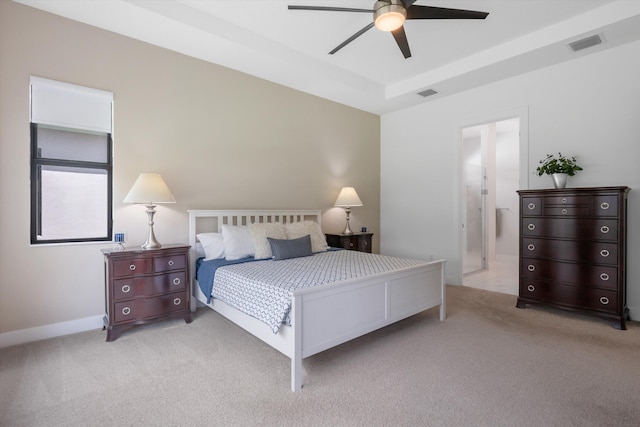 bedroom with ceiling fan and light colored carpet