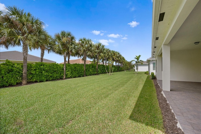 view of yard with a patio area