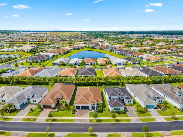 drone / aerial view with a water view