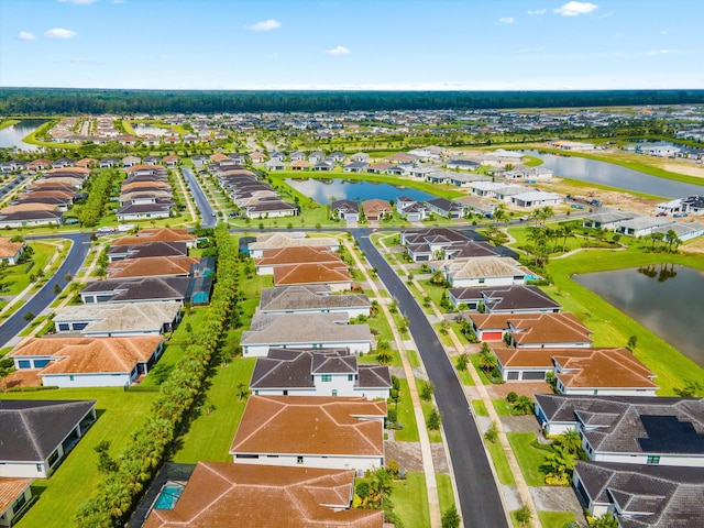 drone / aerial view with a water view