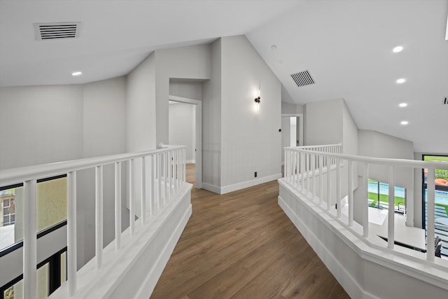 2435 Windsor Way Ct, Wellington, FL 33414 - hallway featuring an upstairs landing, wood finished floors, vaulted ceiling, recessed lighting, and baseboards