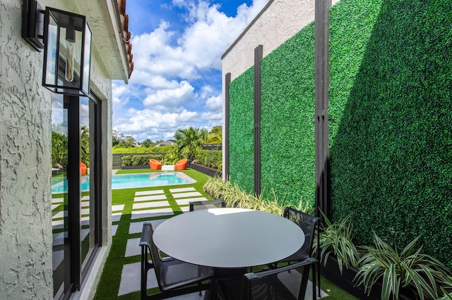 balcony with a patio area