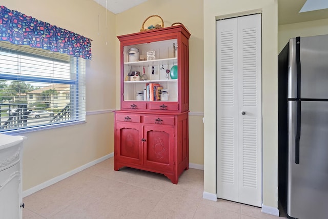 interior space featuring light tile patterned floors