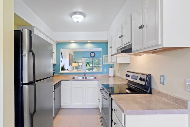 kitchen with white cabinetry, light tile patterned floors, stainless steel appliances, and sink