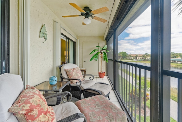 balcony featuring ceiling fan