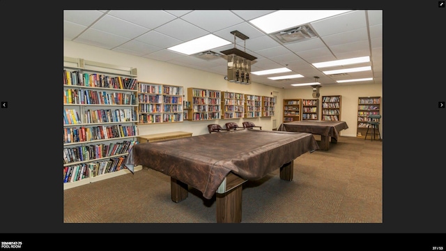 playroom featuring pool table, a paneled ceiling, and carpet flooring