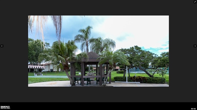 view of home's community featuring a gazebo and a yard