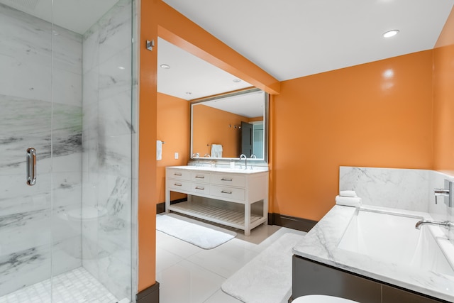 bathroom with vanity, plus walk in shower, and tile patterned floors